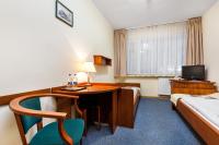 Posteľ alebo postele v izbe v ubytovaní Hotel Olivia