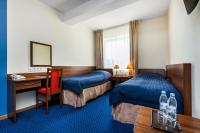 Posteľ alebo postele v izbe v ubytovaní Hotel Olivia