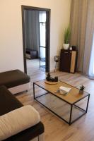 Posedenie v ubytovaní Charcoal Thirteen Apartment