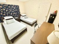 GuestHouse017徳島個室 飲食街中心 阿波踊り会館7分 文理&徳島大学 アスティとくしま車8分にあるベッド