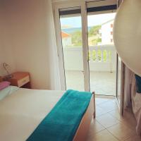 Posteľ alebo postele v izbe v ubytovaní Apartments Edina