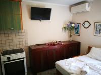 Postel nebo postele na pokoji v ubytování Cristi Apartments