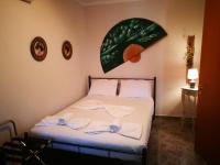 Postel nebo postele na pokoji v ubytování Cristi Apartments