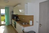 Kuchyň nebo kuchyňský kout v ubytování Apartmány U Evy