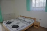 Postel nebo postele na pokoji v ubytování Apartmány U Evy