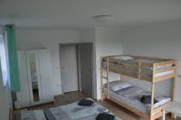 Postel nebo postele na pokoji v ubytování Apartmány U Evy