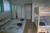 Postel nebo postele na pokoji v ubytování Apartmány U Evy