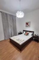 Postel nebo postele na pokoji v ubytování PINE TREE apartment