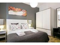 Posteľ alebo postele v izbe v ubytovaní Stay U-nique Apartments Napols I