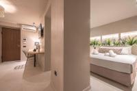 Posteľ alebo postele v izbe v ubytovaní Apollonos 28 Luxury Suites