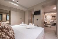 Posteľ alebo postele v izbe v ubytovaní Apollonos 28 Luxury Suites