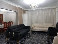 Posezení v ubytování Unique Apartment in Sheraton Heliopolis