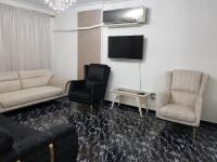 TV a/nebo společenská místnost v ubytování Unique Apartment in Sheraton Heliopolis