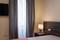 Posteľ alebo postele v izbe v ubytovaní ADRIA Luxury Residence - Centro Trieste