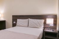Posteľ alebo postele v izbe v ubytovaní ADRIA Luxury Residence - Centro Trieste