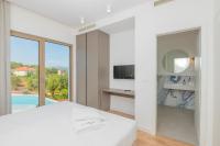 Posteľ alebo postele v izbe v ubytovaní Luxury villa Azure in Imotski, wellness oasis