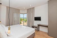 Televízia a/alebo spoločenská miestnosť v ubytovaní Luxury villa Azure in Imotski, wellness oasis