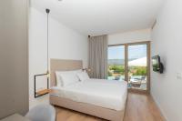 Posteľ alebo postele v izbe v ubytovaní Luxury villa Azure in Imotski, wellness oasis
