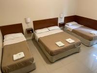 Hotel Nuevo Caminoにあるベッド