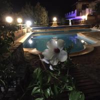 The swimming pool at or close to VILLA VITTORIA with PRIVATE HEATED SWIMMING POOL COMPLETE WITH HIDROMASSAGE FOR EXCLUSIVE USE , SEA VIEW, 150 METERS FROM THE BEACH