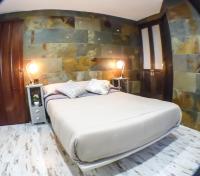 Posteľ alebo postele v izbe v ubytovaní Green Peaks B&B Country House Alojamiento Rural