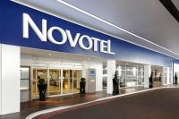 a novisor sign on the side of a store at Novotel London West in London