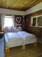 Posteľ alebo postele v izbe v ubytovaní Bambu Lodge @ Ossiachersee