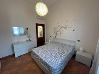 A bed or beds in a room at 34 Arena House