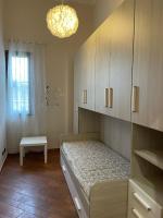 A bed or beds in a room at 34 Arena House