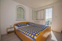 Posteľ alebo postele v izbe v ubytovaní Apartments Relax near Opatija