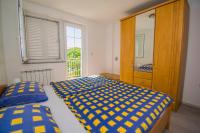 Posteľ alebo postele v izbe v ubytovaní Apartments Relax near Opatija