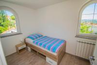 Posteľ alebo postele v izbe v ubytovaní Apartments Relax near Opatija