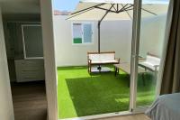 Patio nebo venkovní prostory v ubytování Solarium Beach House
