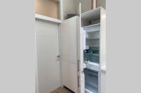 Kuchyň nebo kuchyňský kout v ubytování Solarium Beach House
