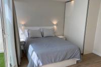 Postel nebo postele na pokoji v ubytování Solarium Beach House