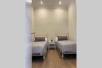 Postel nebo postele na pokoji v ubytování Solarium Beach House