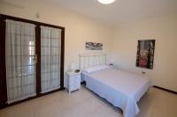 Postel nebo postele na pokoji v ubytování Vivienda Vacacional Villa El Mirador
