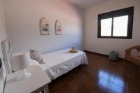 Postel nebo postele na pokoji v ubytování Vivienda Vacacional Villa El Mirador