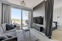 Telewizja i/lub zestaw kina domowego w obiekcie Grand Apartments Chlebova
