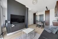 Telewizja i/lub zestaw kina domowego w obiekcie Grand Apartments Chlebova