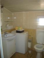 Kúpeľňa v ubytovaní Apartments Benutic-Lalini