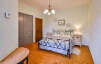 A bed or beds in a room at Il Meriggeto