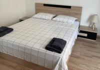 Posteľ alebo postele v izbe v ubytovaní Charcoal Thirteen Apartment
