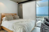 A bed or beds in a room at Suite Horizonte