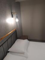Posteľ alebo postele v izbe v ubytovaní Elaėa Boutique Apartments