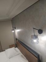 Posteľ alebo postele v izbe v ubytovaní Elaėa Boutique Apartments