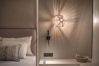 Posteľ alebo postele v izbe v ubytovaní Apollonos 28 Luxury Suites