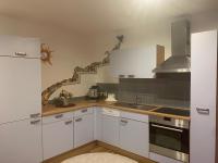A kitchen or kitchenette at Schilcherland-Apartment