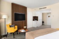 Posteľ alebo postele v izbe v ubytovaní Grand Hotel Esztergom