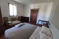 Posteľ alebo postele v izbe v ubytovaní Villa Perale: la tua casa alle pendici delle Dolomiti